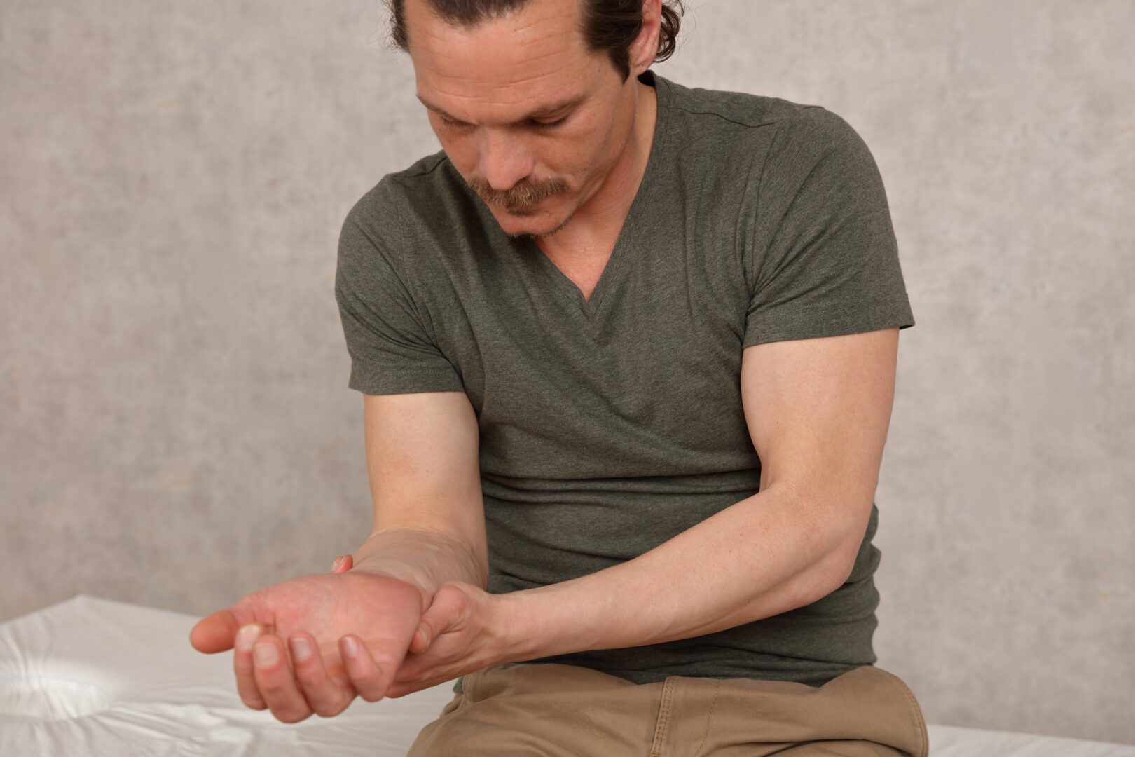 Food allergy symptoms redness, skin rash, swelling. Worried patient waiting doctor's examination