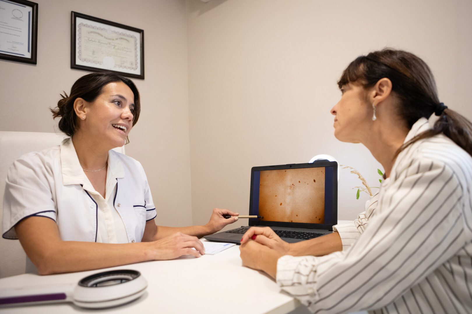 Dermatologist in consultation with female patient - Buenos Aires - Argentina
