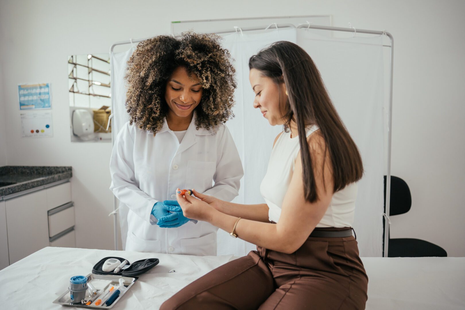 Healthcare professional explaining how to use insulin